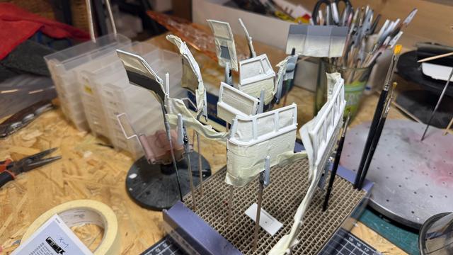 Painted parts of a VW T1 Samba Bus by Revell in 1:24.