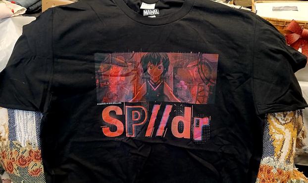 A black t-shirt with a monochrome red screen printing of a closeup of Peni Parker in the cockpit of SP//dr. Below the image in large letters reads SP//dr.