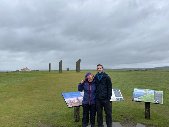 Me and Mum in raincoats in front of Steness