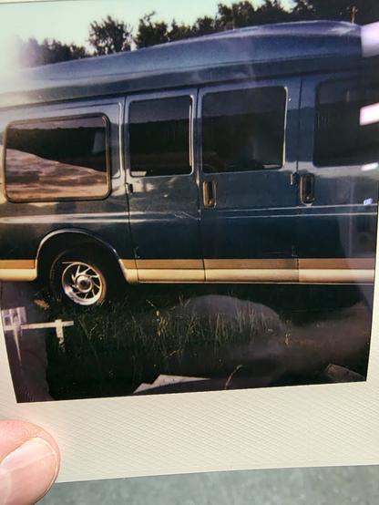 Polaroid side view of the van.