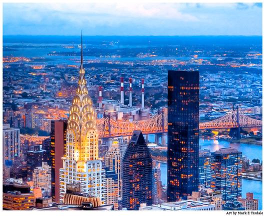 Photograph looking over New York City - one of the most noticeable skyscrapers is the Chrysler Building. It's night and the city lights are in their full glory. The East River is visible beyond.