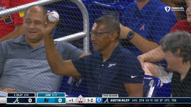 Didier Fuentes' dad, who flew in last minute to attend his son's MLB debut, catches a foul ball in the stands before his son takes the mound