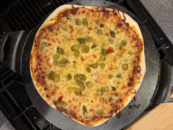 A hot giardinera pizza on sourdough – on a cast iron pan