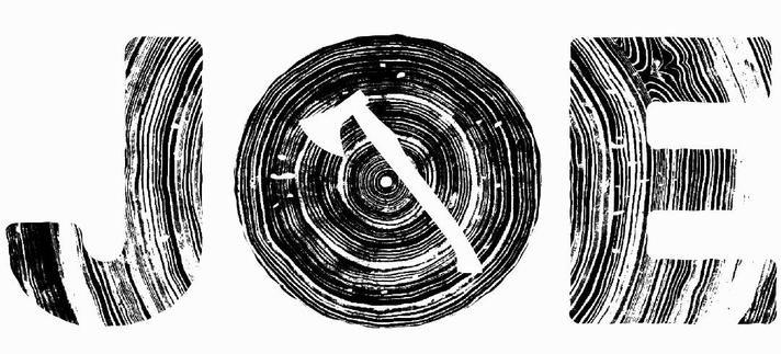 In rough capital letters, the name JOE is printed. The rings of a tree centre in the O, which is filled in and looks like the cut trunk of a tree. The rings emanate from the centre of the O like ripples though the other letters. Superimposed on the tree-trunk that acts at the O is the cutout shape of a broad axe.