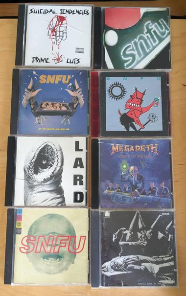 CDS IN A ROW:

SUICIDAL TENDENCIES - PRIME CUTS
SNFU - THE PING PONG EP
SNFU - FYULABA
SNFU - SOMETHING GREEN AND LEAFY THIS WAY COMES
LARD - POWER OF LARD EP (virus 72cd)
MEGADETH - RUST IN PEACE
SNFU - THE ONE VOTED MOST LIKELY TO SUCCEED
CRASS - YOU'LL RUIN IT FOR EVERYONE