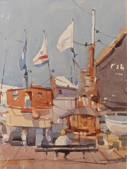 Watercolor painting of ships along the marina in Scheveningen during Vlaggetjesdag. A figure sets on a long bench in the foreground facing boats setting in a marina. The boat on the left has a cream and red wooden accommodation. Figures appear next to the upper and lower entries, under large flags in various folds from the light wind. To the right is a boat with a large, dark purple sail and red, wooden mast.