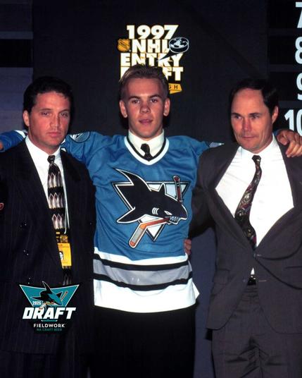 Scott Hannan smiles with Sharks staff after being drafted in 1997.