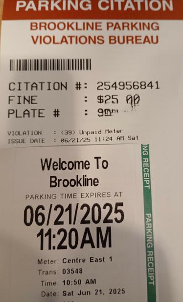 Parking receipt expiring at 11:20, on top of a parking ticket issued at 11:24
