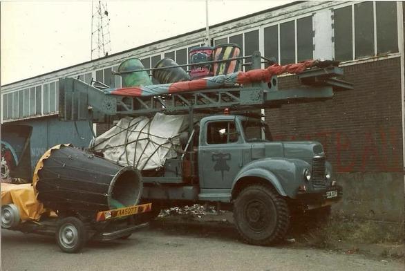 the 1952 commer used by mutoid waste for years. it is grey with a cherrypicker kind of arm across over the cabin, and beautiful round wheel arches and triangular shaped hood. off road tyres. the mutoid logo in darker grey on the door. i loved it so much. i lived in a caravan on the back.