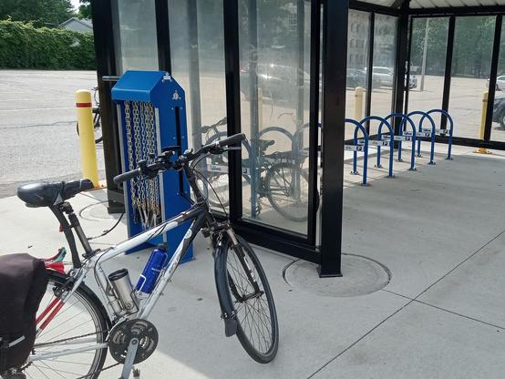 Bike repair station and covered bike parking at the Willis Way LRT station in Waterloo. Bob's bike is in the foreground.