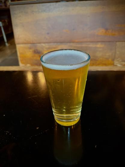 A pint of lager, Nazi Punks Fuck Off, by Future Primitive Brewing.