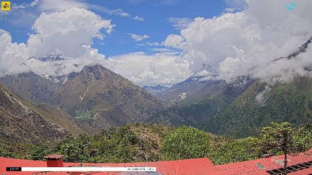 A wide view of several mountains, from left:

- Taboche (6,500 meters/21,325 feet)
- Mount Everest (8,848 meters/29,032 feet)
- Lhotse (8,516 meters/27,939 feet)
- Ama Dablam (6,814 meters/22,355 feet)