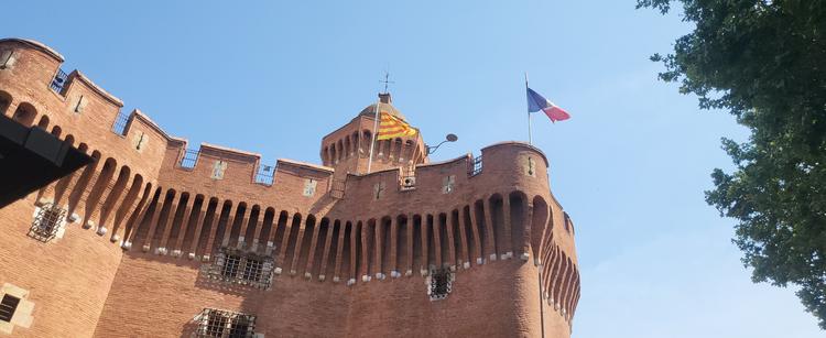The French & Catalan flags flying from the castle in Perpignan.