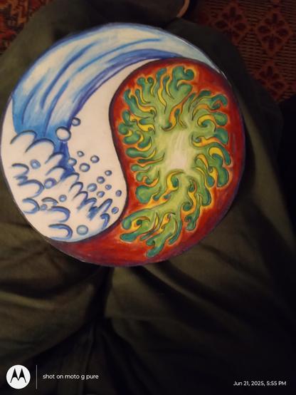 I'mPainted in 2004, I wanted to keep it simple. 

Using the entire surface of the canvas In this image, I reimagined the black and white yin/yang symbol by painting two identical sized. Paisley shapes.
One side is a cresting ocean wave and the other side is a colorful pit of fire with the flames slow burning on the Paisley edge . 
I was going to put a different image of the same thing 20 years later but alas, it seems mastodon is having a not -so-fresh feeling