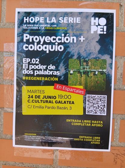 Cartel en una pared anunciando la siguiente sesión, el próximo martes, en el barrio de Espartales.