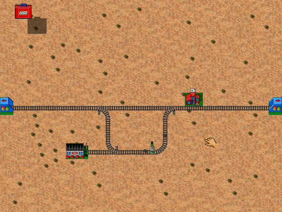 Screenshot from LEGO LOCO showing Sarah's map. It starts at a tunnel on the left, then there's a straight track that gets into a tunnel on the right. There track passes by a Post Office. There's a secondary line branching of from the main one using railroad switches such that trains can leave/arrive at a Depot.