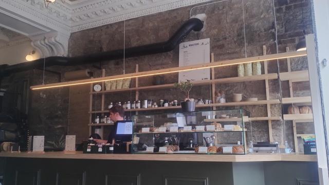 Looking at the main counter of the Roasters café