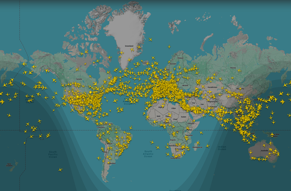 Worldmap of flighradar24 with way too many yellow colored airplanes, highest concentrations on Europe, USA