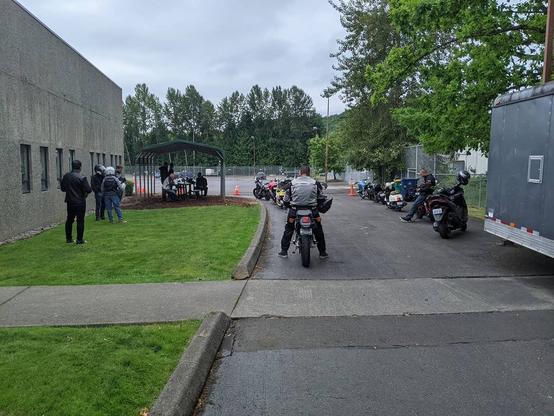 Photo by Neil E. Hodges in Evergreen Safety Council. May be an image of one or more people, motorcycle and road.