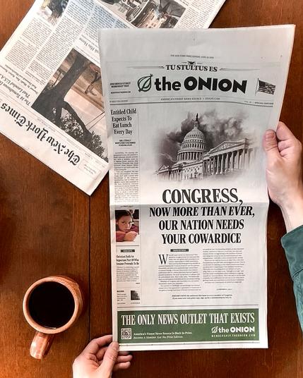 Photo by Ben Collins on June 22, 2025. May be an image of 2 people, newspaper, magazine and text.