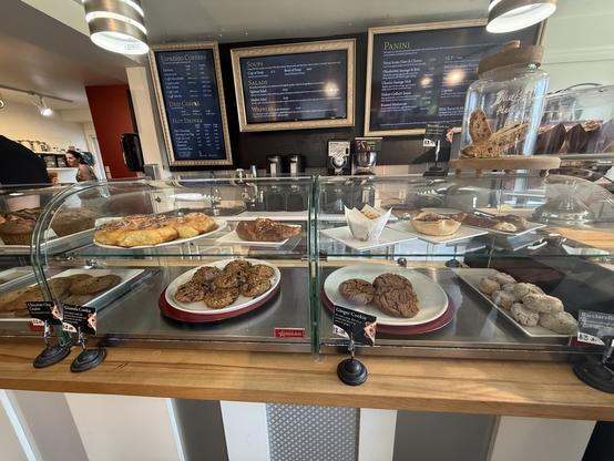 Pastries on display along with the menu board at Pavia Café.