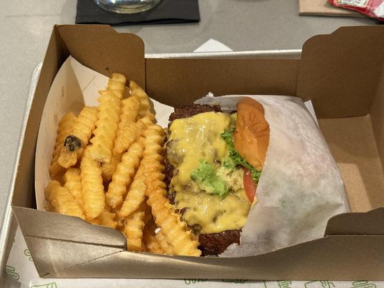 Crinkle fries and a double burger with cheese
