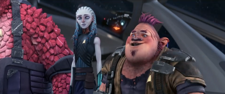 A shot of a confident Jankom on the bridge of the Protostar.  Gwyn and Rok are standing next to him.  From E120