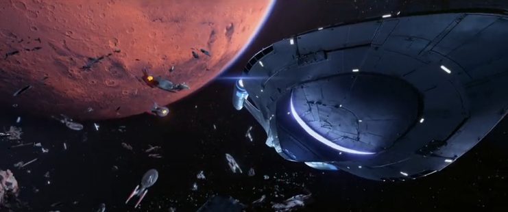 A close-up shot of the Protostar from the lower right racing away from the armada of Starfleet Starships destroying each other.  From E120