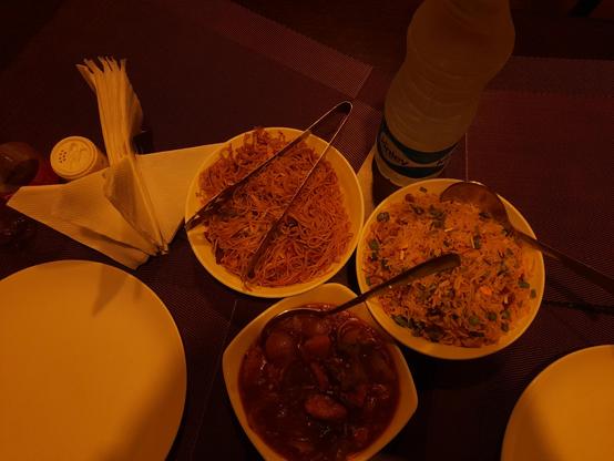 A top view of what the mappers ordered to "refuel" themselves, noodles, fried rice and chilli chicken, along with some water, bottles of coke in the corner. Allegedly, they washed it all down with some coffee in the end.