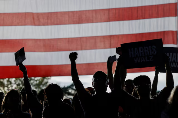 Pic of supporters of Democratic presidential nominee and U.S. Vice President Kamala Harris react during a campaign rally in Charlotte, North Carolina, U.S., November 2, 2024:
