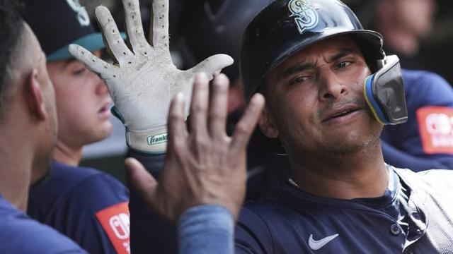 Solano powers the Mariners past the Cubs 14-6