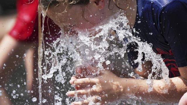 Sports play through another dangerously hot day in parts of the US