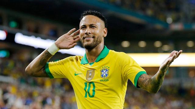A man in Brazilian soccer kit.