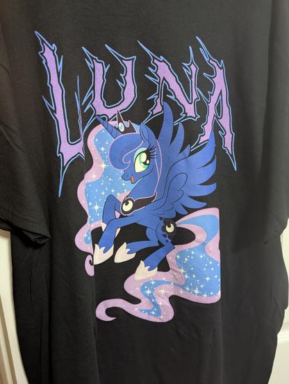 A T-shirt featuring Princess Luna from the television show My Little Pony Friendship is Magic with her name above the image in a metal-like font.