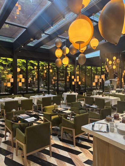 Glamorous dining room with a glass ceiling.