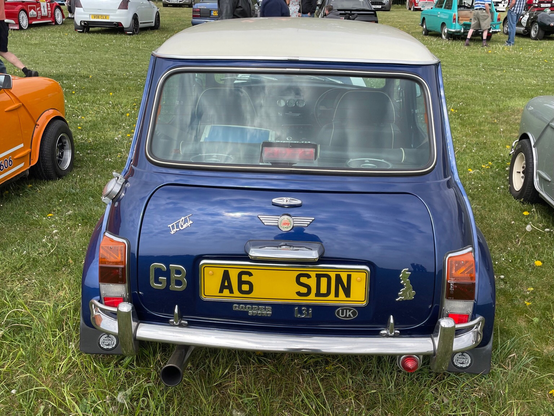 Happy #MiniMonday with this personalised #ClassicMini Cooper, we specialise in engine bay stickers for these and more! http://miniphernalia.co.uk