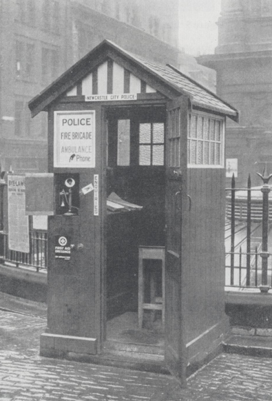 Wooden police box of the type instituted by Crawley for Newcastle City Police. Note the public-facing telephone and first aid boxes mounted to the left of the door. From The Police Journal, vol.1, No.1, January 1928
