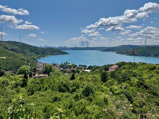 View from Yoros castle over verdant hills and blue seas