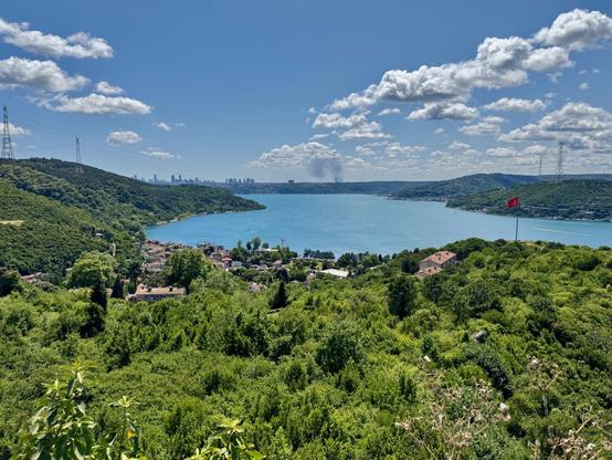 View from Yoros castle over verdant hills and blue seas