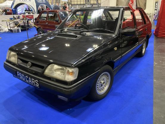 Black FSO Polonez, front quarter view
