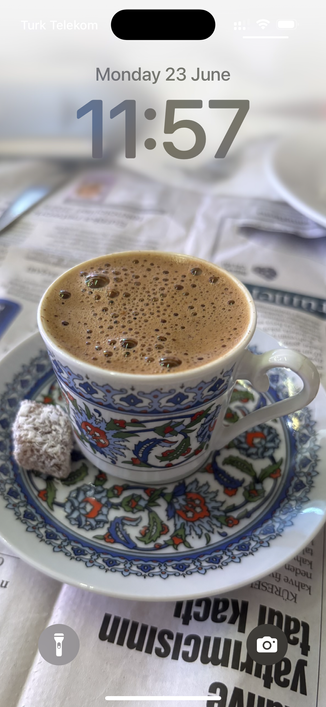 Lock screen for iPhone featuring a cup of Turkish coffee.