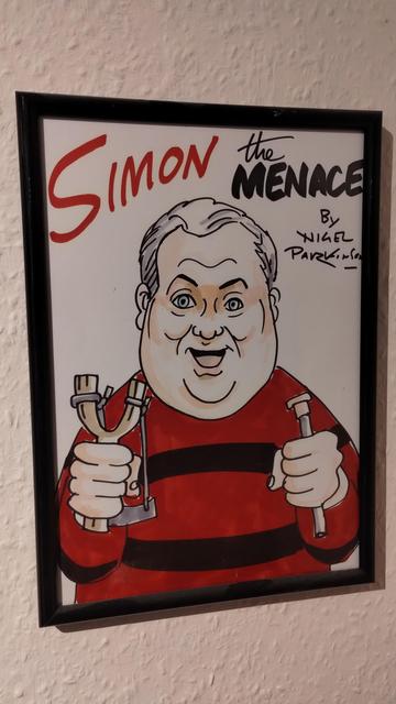 A cartoon of my late husband Simon by Nigel Parkinson in the style if Dennis the Menace - Simon the Menace