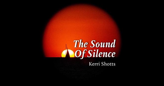 "The Sound Of Silence" by Kerri Shotts. Album photo shows a yellow sun setting over the water's horizon; the sky a deep red with a heavy vignette. There is a small sailboat on the water in silhouette in front of the setting sun.