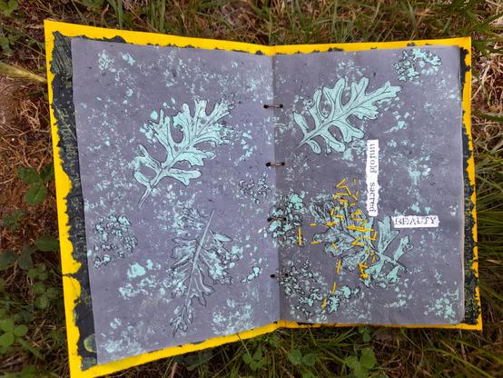 #2: double page with mint green prints of the fern-like leaves again, some yellow slow stitching, some drawing with a black pencil (to enhance some structures), and the words: 'unfold sacred' and 'BEAUTY'.