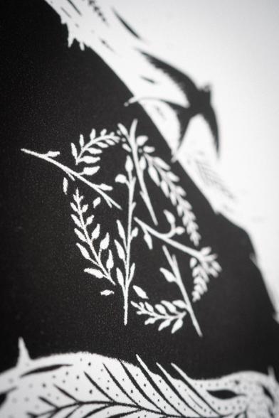 Zoom sur le symbole anarchiste végétalisé