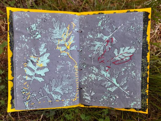 #12 Another double page with the fern-like leaves printing. This has slow stitching in yellow and red, mainly coming from the back sides.