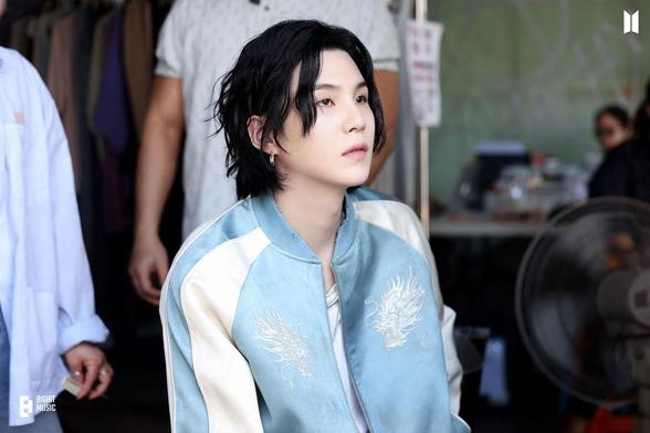 Agust D - D-Day Concept Photos, April 2023 - Watching footage, blue jacket.