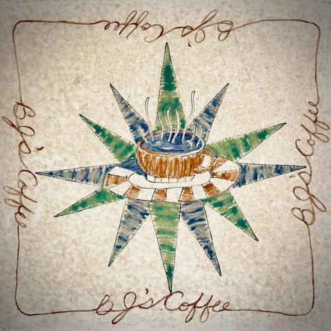 A single cream-colored floor tile fills the frame, displaying painted hot coffee with blue and green rays shooting out from behind the saucer, all bordered by the text, "BJ's Coffee," on each of the four edges of the tile.