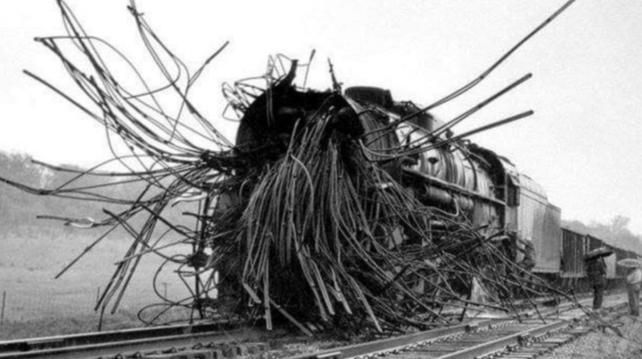 Historical photo of an exploded steam locomotive, boiler tubes flung outwards like some demented tentacled sea creature.