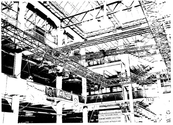 A 1-Bit black and white image of the GPN ceiling, showing scaffolding and the glass roof, with some flags barely identifiable hanging from the second floor.